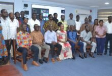 • Prof. Appiaagyei-Atua (seated fourth from left) with Mr Zakariah M. Tanko (seated third from right) and other participants after the programme Photo: Victor A. Buxton