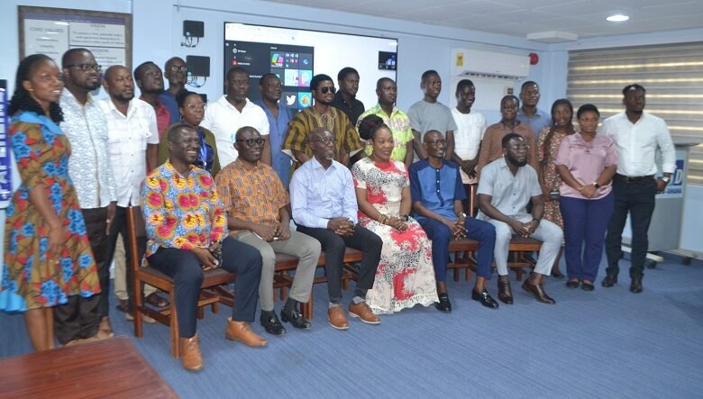• Prof. Appiaagyei-Atua (seated fourth from left) with Mr Zakariah M. Tanko (seated third from right) and other participants after the programme Photo: Victor A. Buxton