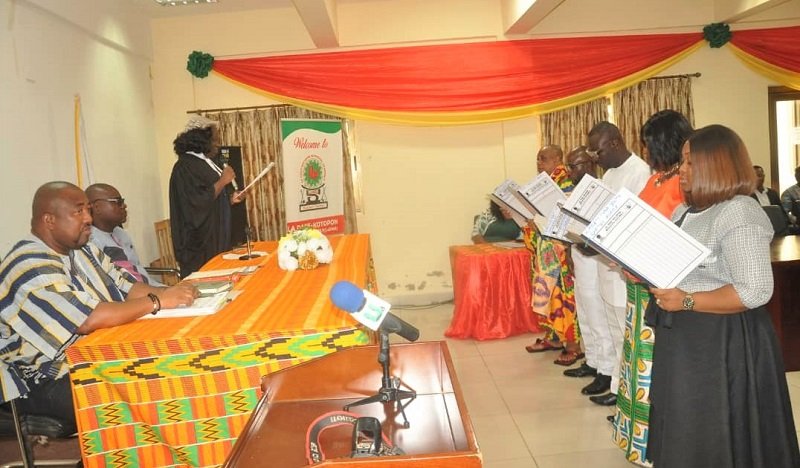 • Justice Asumadu-Sekye (third from left) swearing in the newly government appointees