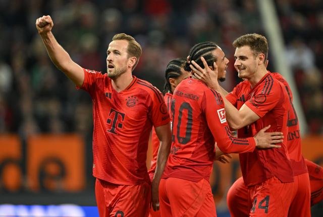 Bayern players celebrating their win against Augsburg recently