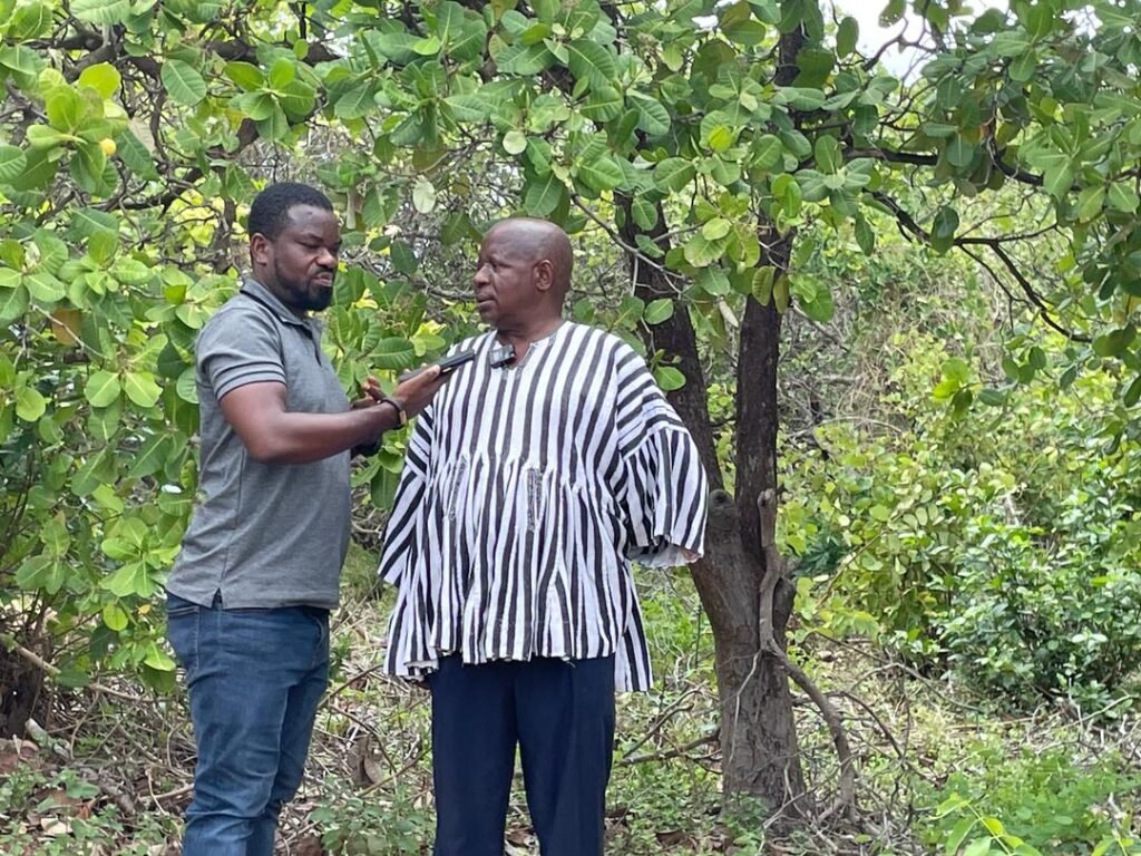 Mr Alex Bonsu being interviewed on a Cashew farm at Banda