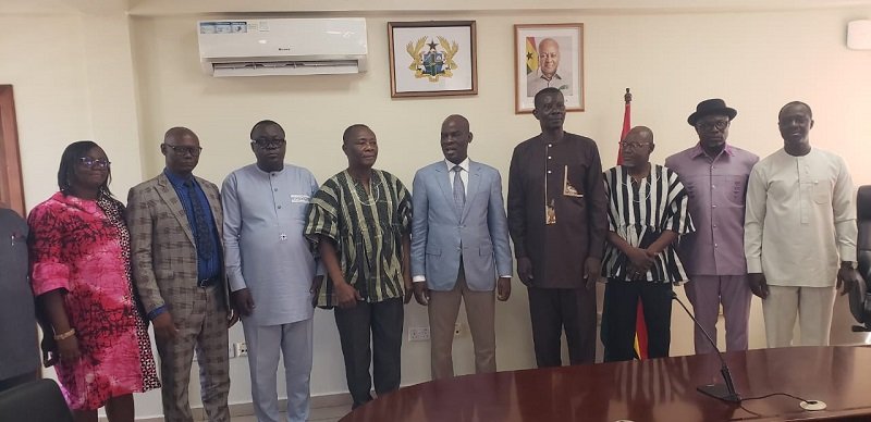 Mr Haruna Iddrisu (middle) with member of the committee