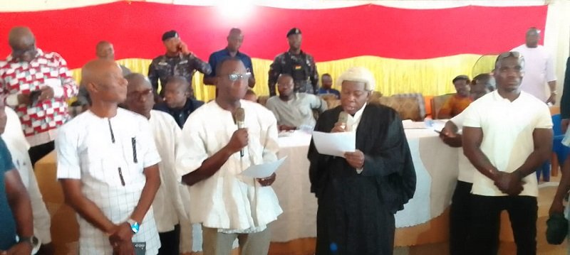 My Worklachie( with microphone)taking the oath of office