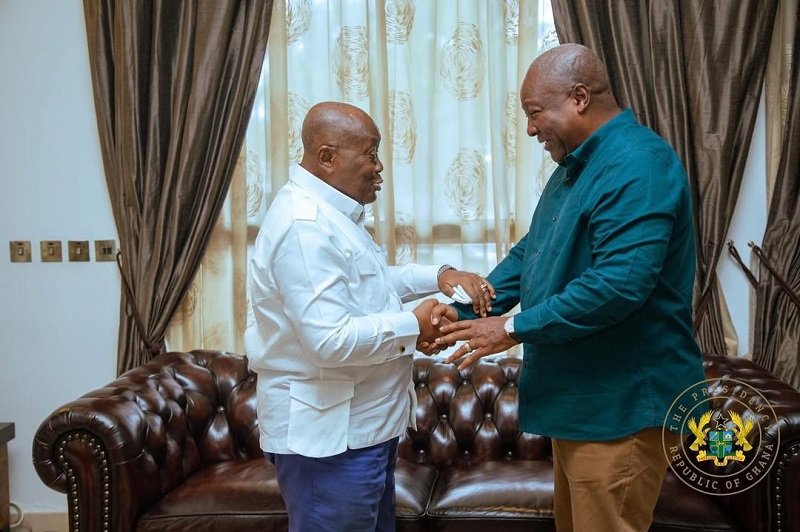 President Mahama (right) interacting with Former President Akufo-Addo