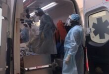 A team from GIDC led by Dr. Aidoo (first from the right in white PPE) seen transporting a patient on ventilatory support to the Korle Bu Dialysis Unit.