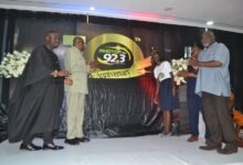 Dr Ampofu (second from left) with Mr Paa Rock Van Percy (right) and other dignitaries after unvailing the anniversary logo Photo Victor A. Buxton