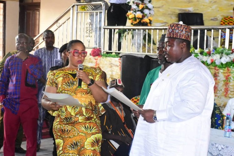 Ms Linda Ocloo swearing in Mr Haruna Mohammed Awal into office Photo Seth Osabukle