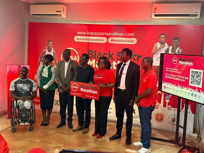Nana Essilfuah Tamakloe (third right) with some dignitaries including Raphael Botsyo Nkegbe (far left), winner of the wheelchair race last year