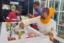 • Officials from FDA inspecting some of the illicite drugs in a shop