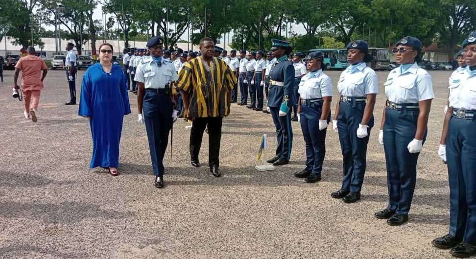 • Mr Samuel Nartey George (right), Mrs Imani Ouaadil (left) being led by the Parade Commander, Flt Lt Nana Kwesi Anim Kwakye to inspect the parade