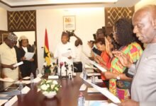 Her Ladyship Justice Abena Asuamah Oppong (arrowed) swearing in the council members. Photo. Ebo Gorman