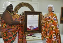 • Mrs Thompson (right) receiving her citation for the acting Ga Manye