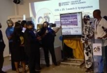 • Professor Nana Aba Appaiah Amfo (left) with some stakeholders to unveiling the anniversary cloth