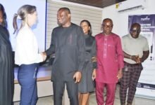 • Ms Hanna Schlingmann (left) in a handshake with Mr Felix Gyamfi after the programme Photo: Victor A. Buxton
