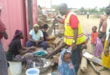 • Mr Morton interacting with some affected residents