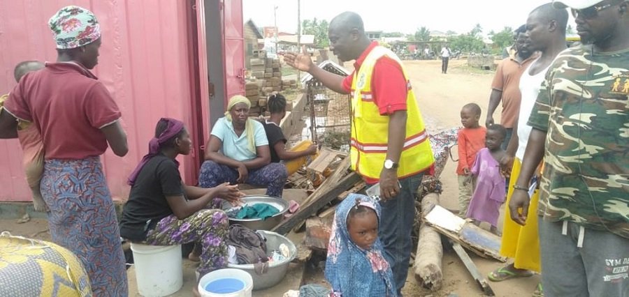• Mr Morton interacting with some affected residents