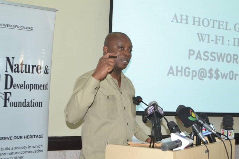 Dr Brown (inset) speaking at the event Photo: Victor A Buxton