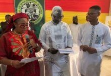 Ms Linda Ocloo (left) swearing in Mr Ibrahim FailaFuseini (middle).Looking on is Mr Francis-Xavier KojoSosu