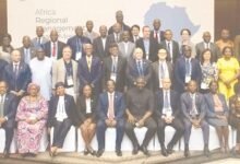 • Mr John Dumelo (seated seventh from right) with other participants of the programme