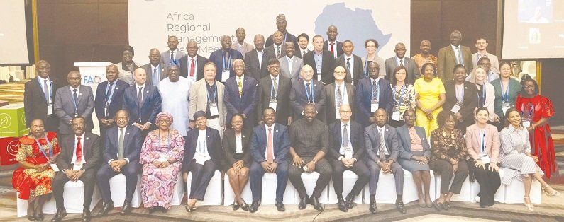 • Mr John Dumelo (seated seventh from right) with other participants of the programme