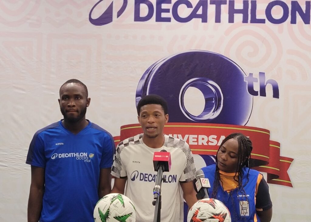 Mr Agbodo flanked by Mawuli Kofi and Ms Arhin the company’s B2B Manager