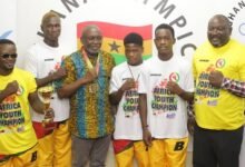 Mr Akpokavie (third left) together with the boxers and their coaches