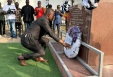 • Mr Kofi Adams laying a wreath on behalf of government and people of Ghana