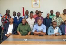 • Mr Kofi Adams (seated middle) with staff of the ministry and members of the GOC