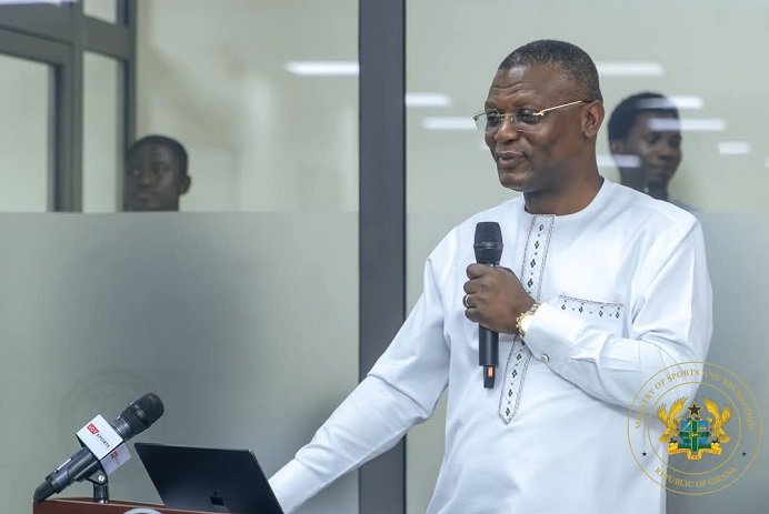 • Mr Adams (Inset) and the participants after the programme