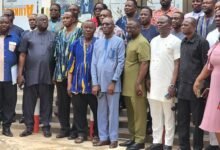 Mr Nortsu (sixth from right) with members of committee and authorities of the WIUC-GH after the visit