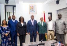 Mr Ampem (middle) with Dr Zakariah (left) and other members of the NIC board