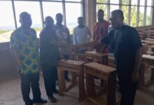 • Mr Seth Kpedor (right) presenting the furniture to Mr Francis Kudolo