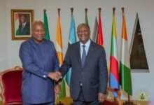 • President John Mahama (right) in discussion with President Alassane Ouattara