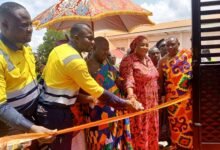 • Officlas from AngloGold, Chief and dignitaries cutting the tape to inaugurate the facility