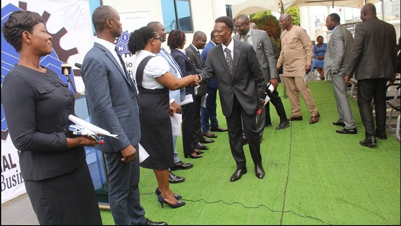 Mr Morgan Ayawine (infront), Doli-Wura Awushie Abdul-Malik Seidu Zakaria and other dignitaries congratulating the newly elected NIB PMSU executives at the inauguration Photo: Ebo Gorman