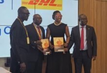 • Mr Uloko (second left) with Pearl Nkrumah, the Executive Director for Retail and Digital Banking at Access Bank Ghana PLC (second right) and Mr Mbaye and Head SME Africa, Kafui Bimpe displaying the MoU