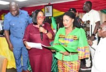 • Ms Linda Ocloo (left) swearing in Ms Ebi Bright as Tema Metropolitan Chief Executive Photo: Seth Osabukle
