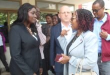 • Prof. Quain (right) interacting with some participants after the meeting