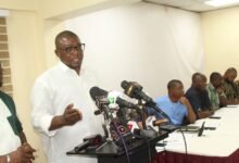 • Awudu Ishaq (behind the mic) addressing the press conference Photo: Ebo Gorman