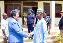 • Mrs Virginia Palmer interacting with Mr Ali Adolf John Mburidiba, Northern Regional Minister after the meeting