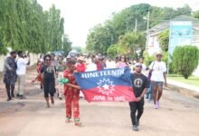 Members of AAAG and staff of GTA during the parade to commemorate Juneteenth