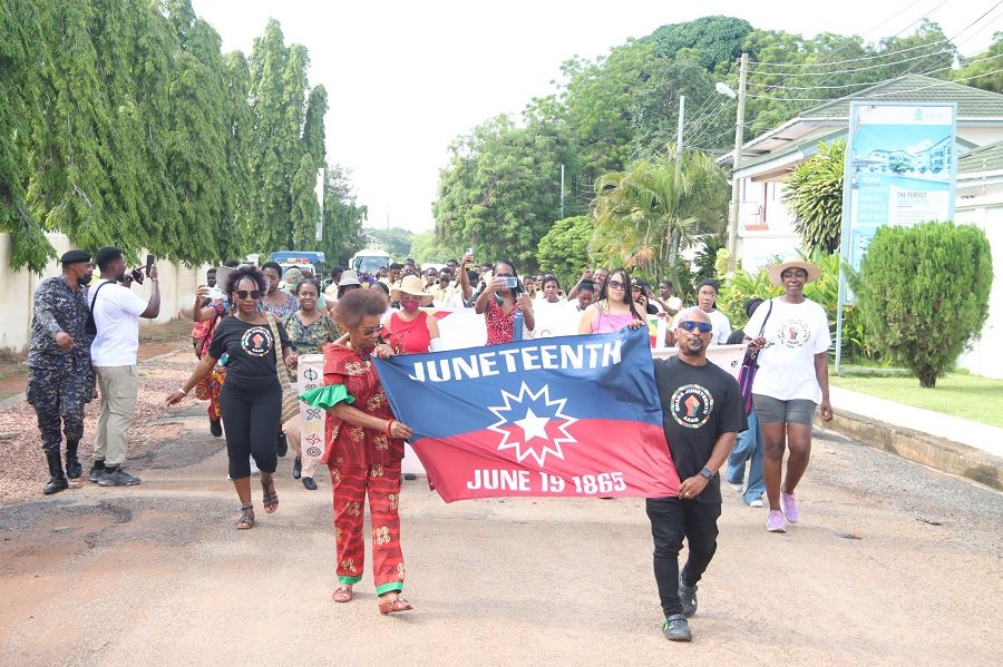 Members of AAAG and staff of GTA during the parade to commemorate Juneteenth