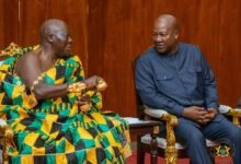 • Otumfuo Osei Tutu II conversing with President John Mahama