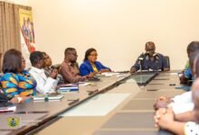 • Prof. Ernest Kofi Davis (middle) addressing journalists
