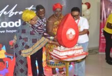 • Mr Akandoh (second from left) being assisted by Dr Branka (right) and other dignitaries to cut the cake to celebrate the day Photo: Victor A. Buxton