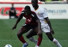• Black Stars’ Gideon Mensah (14) kept it tight on his marker in this scene