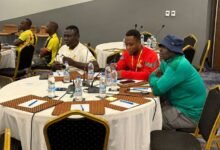 • Coach Frimpong Manso (in white) with other members of the Ghana team