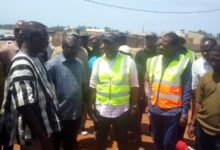 • Mr Gilbert Adjei (middle) and othe r officials during a visit ahead of the second phase of the Blekusu sea defence project