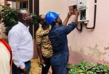 ECG technician installing the new meters