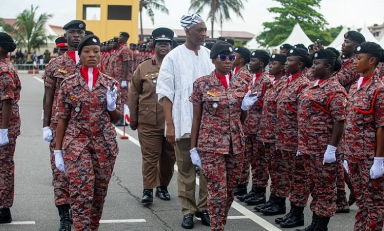 • Alhaji Muntaka Mohammed-Mubarak (in smock) inspecting the parade during the graduation ceremony